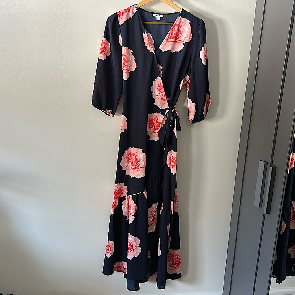 Beautiful Navy blue wrap dress with pink floral design.  3/4 length sleeves.